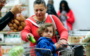 Mom & son receive produce